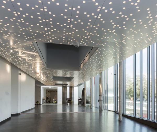 Metal ceiling perforated lighting